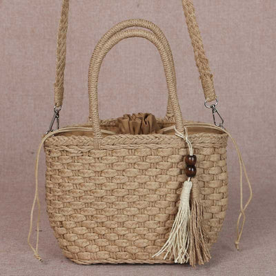 weave shoulder bag made from natural materials Handmade work by a group of housewives. Cute bag shape with tassels. to be chicกระเป๋าสานสะพายข้าง ทำจากวัสดุธรรมชาติ งานแฮนด์เมดโดยกลุมแม่บ้าน ทรงกระเป๋าสวยน่ารักมีพู่ห้อย ให้ความเก๋ชิค