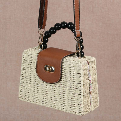 This bag is absolutely stunning, with its intricately crafted pearl handles adding an extra touch of luxury. The exquisite craftsmanship has made this bag so well-made that you'll definitely be impressed. It's also a pleasure to carry around. Get ready for this chic bag!กระเป๋าใบนี้ดูน่าทึ่งอย่างยิ่ง พร้อมหูไข่มุกที่สร้างขึ้นอย่างประณีตซึ่งเพิ่มความหรูหราเป็นพิเศษ งานฝีมือชั้นยอด ทำให้งานนี้ออกมาดีจนคุณจะต้องประทับใจอย่างแน่นอน ซึ่งทำให้พกพาไปไหนมาไหนได้อย่างเพลิดเพลิน เตรียมพบกับกระเป๋าสุดเก๋ใบนี้ได้เลย!