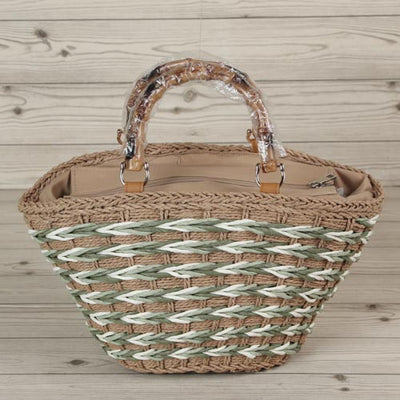 Our woven bags come in a variety of colors and are made from natural materials that are hand-dyed for a smooth and charming texture. They feature convenient zippers and are meticulously crafted in beautiful shades. Wooden handles add a touch of flair to the bag. This woven bag is sure to please.กระเป๋าสานของเรา มีหลายสีและทำจากวัสดุธรรมชาติที่ย้อมด้วยมือเพื่อให้เนื้อสัมผัสเรียบเนียนและมีเสน่ห์ มีซิบรูดที่ใช้งานได้อย่างสะดวก เฉดสีสวยงามสร้างขึ้นอย่างพิถีพิถัน หูหิ้วทำจากไม้ที่ช่วยเพิ่มความโดดเด่นให้กับกระเป๋