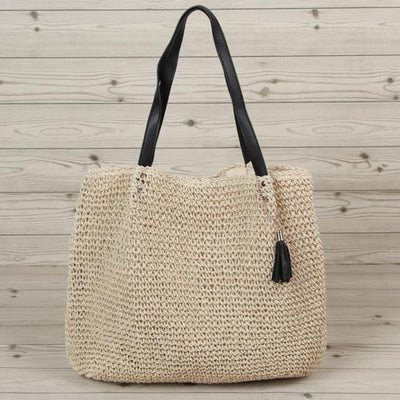 Embrace casual style with our woven bag, featuring intricate details and a spacious design lined with fabric. The carefully selected leather strap ensures durability and weight capacity, making it perfect for the beach, everyday use or weekend getaways.Embrace casual style with our woven bag, featuring intricate details and a spacious design lined with fabric. The carefully selected leather strap ensures durability and weight capacity, making it perfect for the beach, everyday use or weekend getaways.