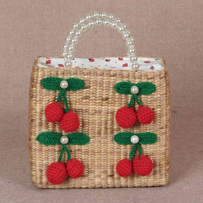 Handmade woven bag from water hyacinth decorated with red cherries luxury with pearls Lining fabric is a zipper. Interested to order or ask for more information at @giftandme.comกระเป๋าสานแฮนด์เมดจากผักตบชวา ตกแต่งไปด้วยน้องเชอรี่สีแดง หรูหราไปด้วยสายไข่มุก บุผ้าซับในเป็นซิบ สนใจสั่งซื้อ หรือสอบถามเพิ่มเติมได้ที่@giftandme.com