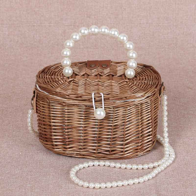 Bamboo woven bag, round shape, chic design, bring pearls to make a cute bag strap. handicrafts by housewives Inside there is a small lining pocket. Tall shape looks great. Wholesale at a pocket-friendly priceกระเป๋าสานไม้ใผ่ ทรงกลม ดีไซน์สุดเก๋ นำไข่มุกมาทำเป็นสายกระเป๋าได้อย่างน่ารัก งานฝีมือโดยกลุ่มแม่บ้าน ด้านในมีกระเป๋าซับใบเล็ก ทรงสูงดูดีสุดๆ ขายส่งในราคาสบายกระเป๋า
